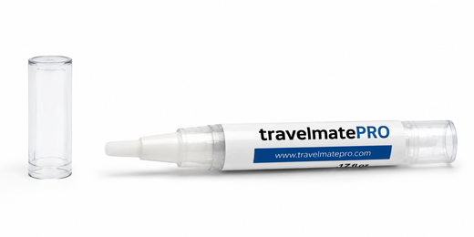 TravelMatePro uncapped silicone lubricant pen showing brush tip